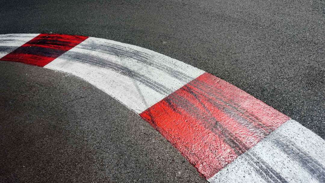 Why Are Race Tracks Banked? | Pitlane Supply